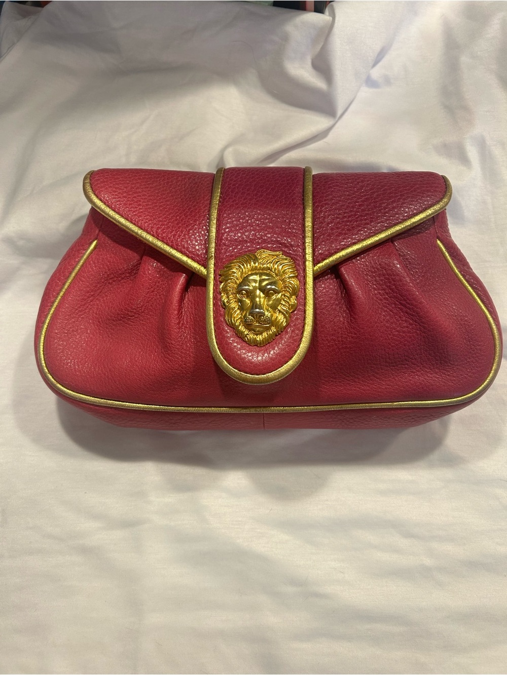 Fuchsia Hayden Panettiere Leather Clutch with 18k Gold plated Lion Accent